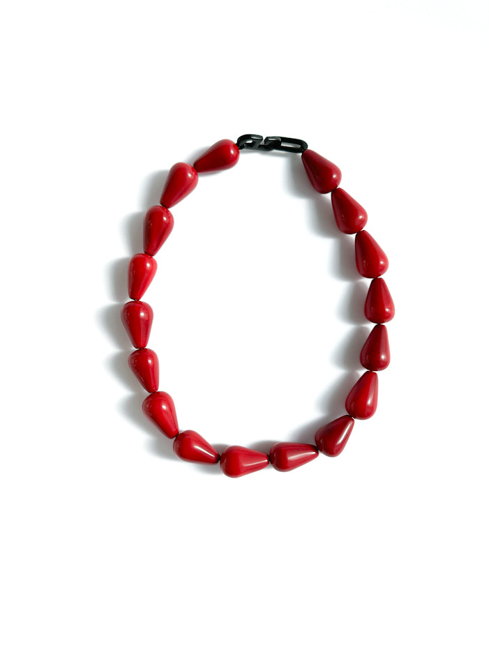 Halssmykke i taguanøtt, rød - Dione