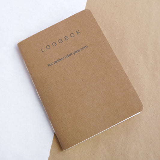 Liten notatbok - "Loggbok for reiser i det ytre rom"