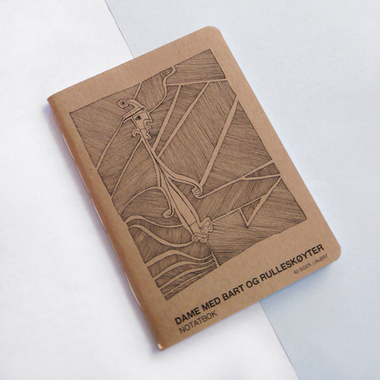 Liten notatbok –"Dame med bart og rulleskøyter"